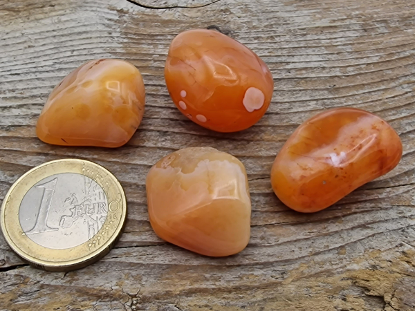 orange botswanaagate tumbled stone