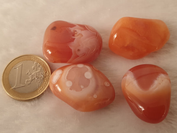 orange botswanaagate tumbled stone