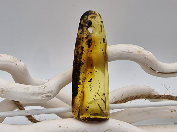 amber with drilling